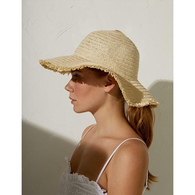 beige floppy hat