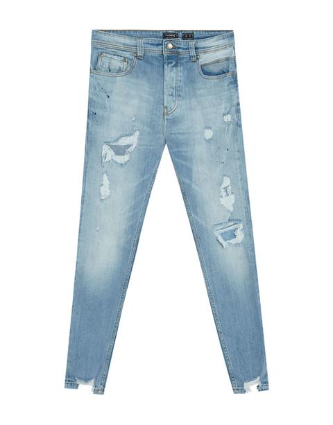 Jeans Carrot Fit Con Strappi