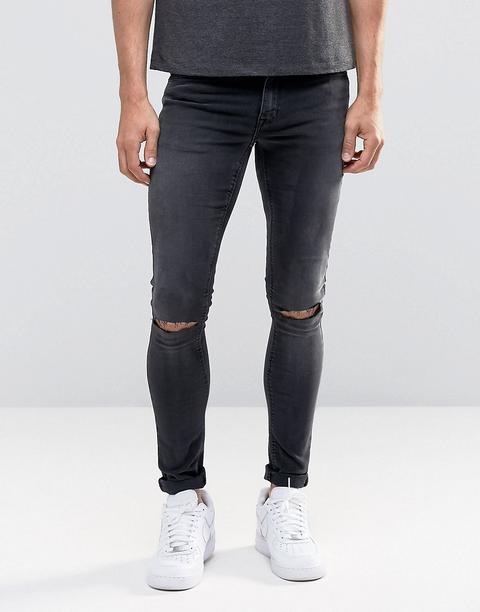 Asos - Jeans Extreme Skinny Neri Slavati Con Strappi Alle Ginocchia - Nero