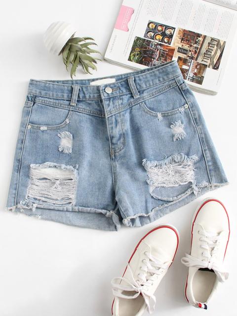 Shorts In Denim Strappati Orlo Sfilacciato