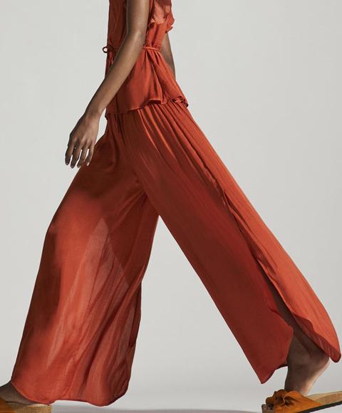 Pantalón Largo Satinado Color: Naranja Talla: L Material: Poliéster,