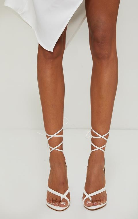 white cross strap heels