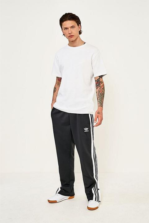 adidas track pants poppers