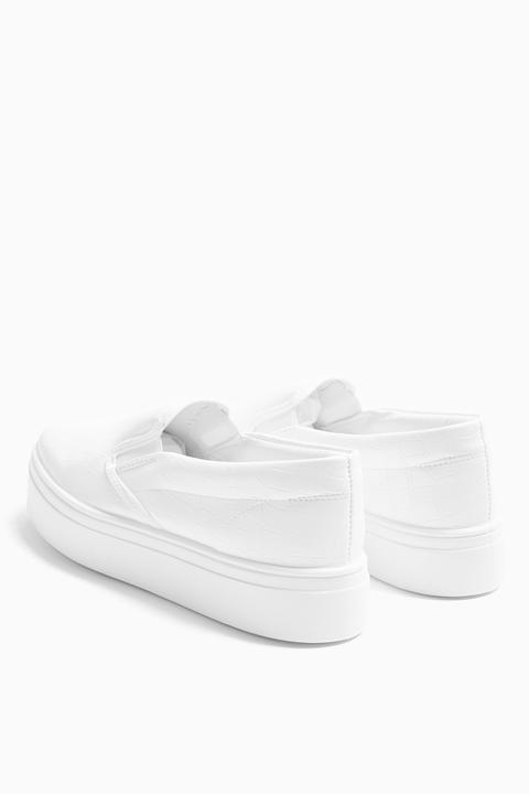 white slip on trainers