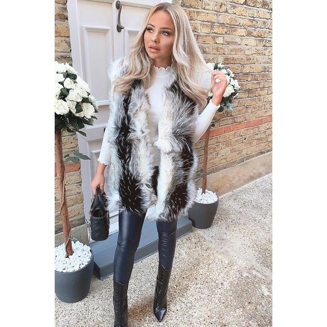 white faux fur gilet