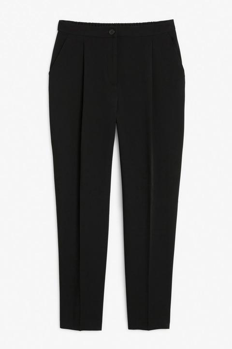 Tailored Tapered Trousers - Black from Monki on 21 Buttons