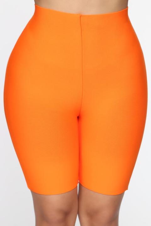 orange biker shorts