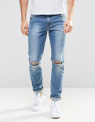 Asos - Jeans Skinny Lavaggio Medio Con Strappi Alle Ginocchia - Blu