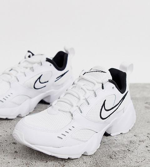 nike white and black air heights trainers