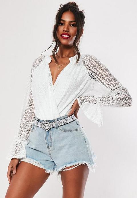 white crochet bodysuit