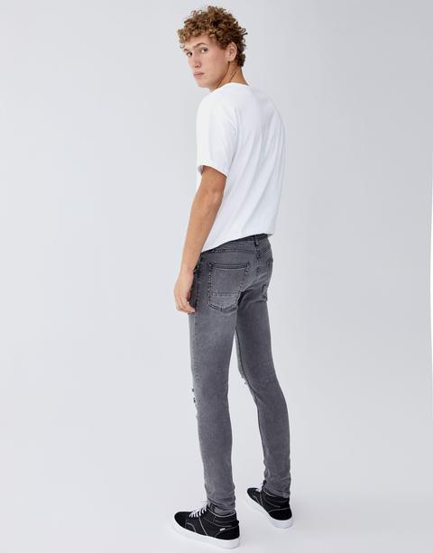 Jeans Skinny Fit Con Rotos