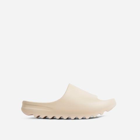 Playoff Flat Slider Sandal In Off White Rubber, White