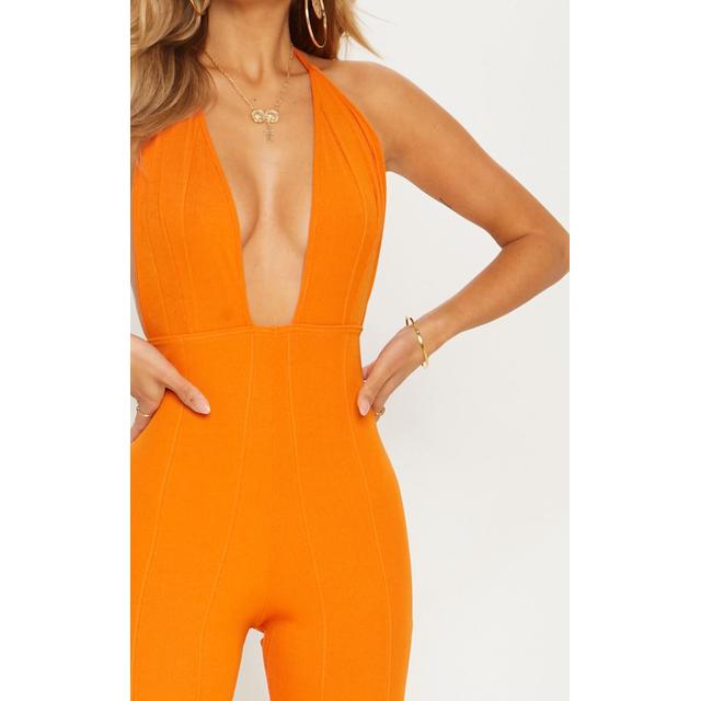 orange bandage plunge flared leg jumpsuit