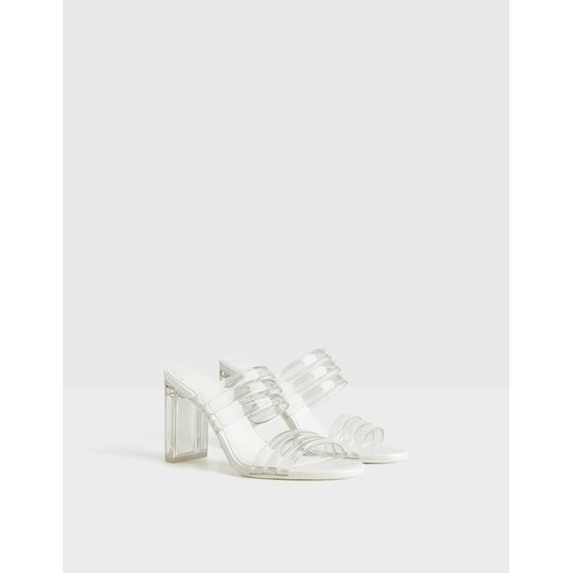 High-heel Sandals With Vinyl Straps And Methacrylate Heels. from Bershka on  21 Buttons