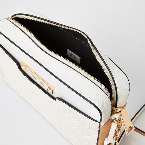 White Ri Embossed Boxy Crossbody Bag from River Island on 21