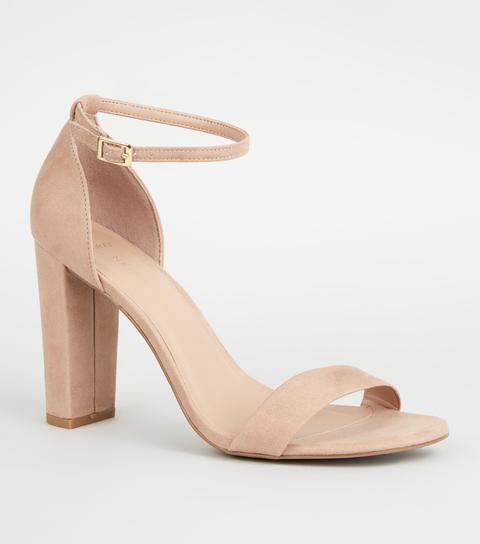 Truffle Collection wide fit mid block strappy tie leg heeled sandals in  cream | ASOS