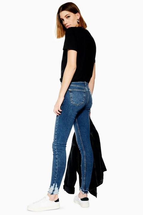 mid blue rip hem jamie jeans