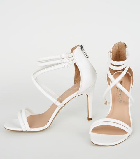 white strappy stiletto heels