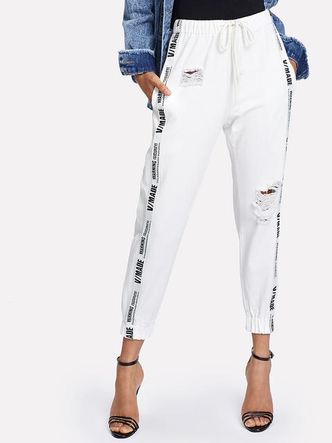 Pantaloni Stampati Strappati