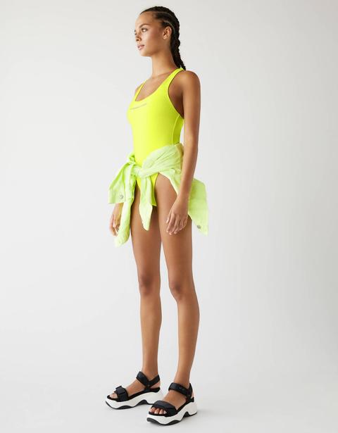 Neon Swimsuit Featuring A Reflective Slogan