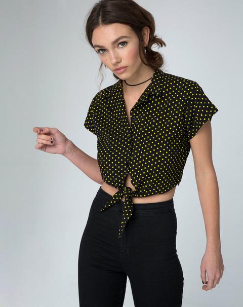 yellow top with black polka dots