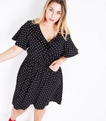 Curves Black Polka Dot Wrap Front Dress from NEW LOOK on 21 Buttons