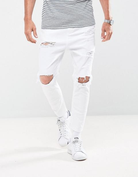 Bershka - Jeans Carrot Skinny Bianchi Con Strappi - Bianco