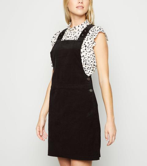 black corduroy pinafore dress