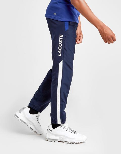 white lacoste track pants