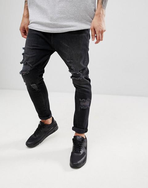 Asos Design - Jeans Nero Slavato Con Cavallo Basso E Strappi Vistosi - Nero