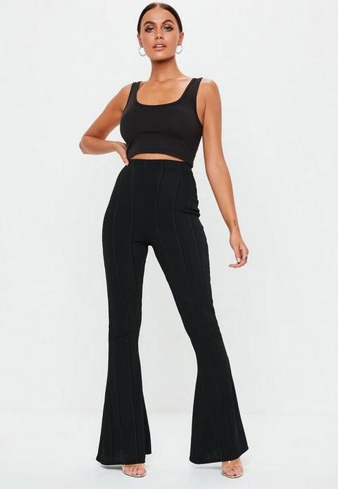 Missguided Tall ribbed flare trousers in black