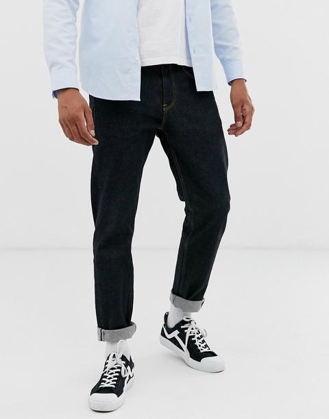 Asos Design Tapered Jeans In Flat Washed Black