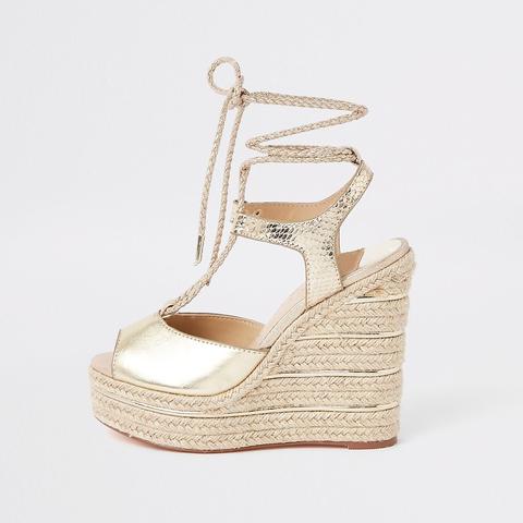 gold wedges tie up