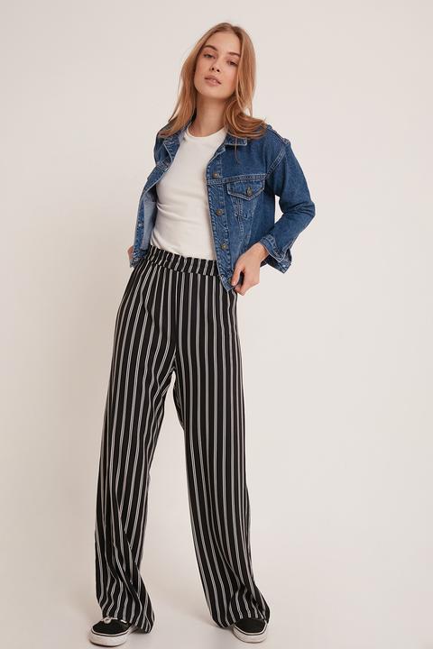 Pantalón palazzo a rayas con cinturón de tela | Freddy Official Store
