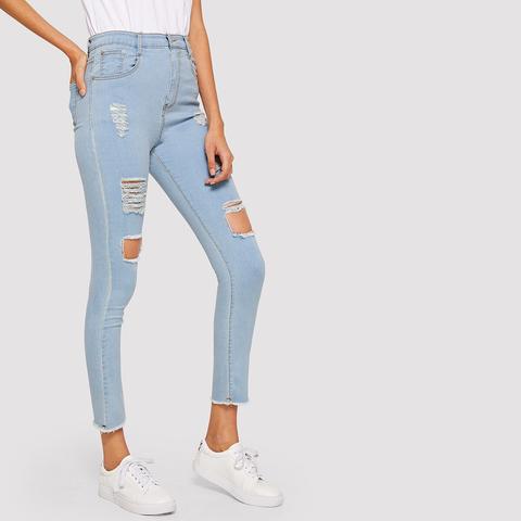 Jeans Strappati Con Vita Alta E Orlo Grezzo
