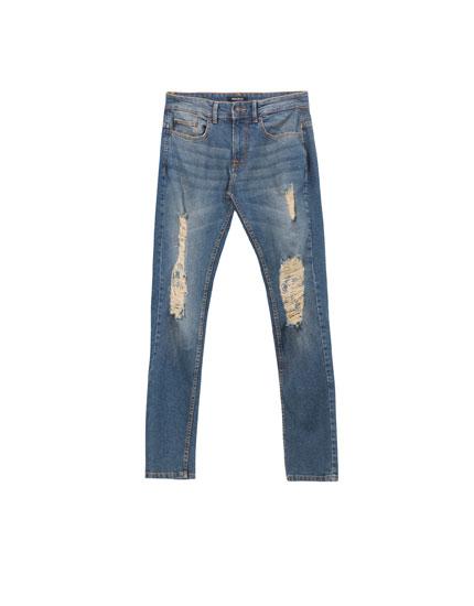 Jeans Slim Fit Con Rotos