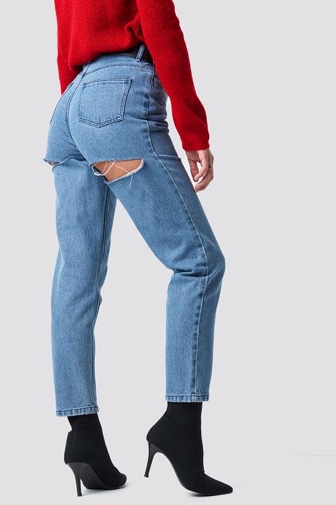 jeans with rips in front and back
