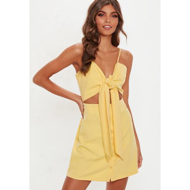 yellow dress with buttons down the front