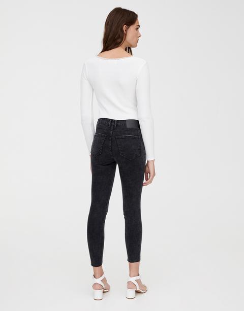Jeans Skinny A Vita Media Con Strappi