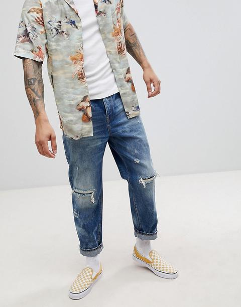 Asos Design - Jeans Stile Skater Lavaggio Vintage Blu Scuro Con Strappi E Rattoppi - Blu