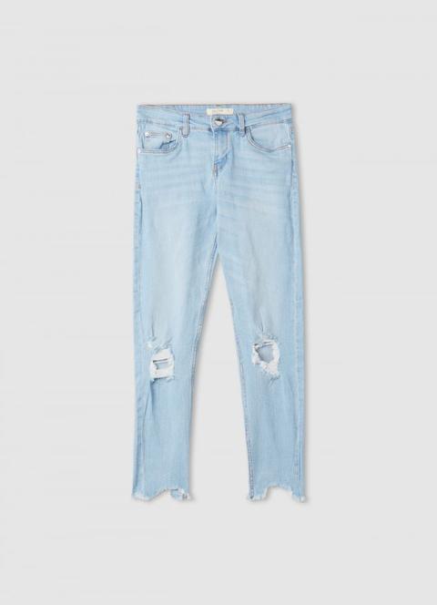 Jeans Con Rotture Chiaro