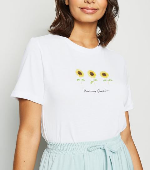 white sunflower shirt