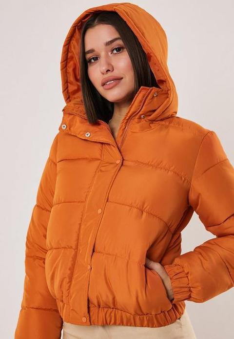 orange hooded puffer jacket