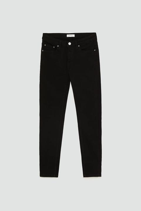 black jeans with buttons