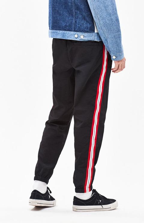 red trousers with side stripe
