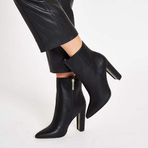 black pointed heeled boots