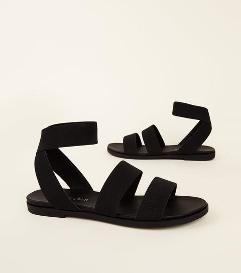 black elastic sandals