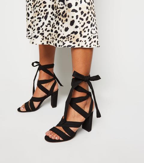 Tan Suedette Lace Up Peep Toe Heels New Look from NEW LOOK on 21 Buttons