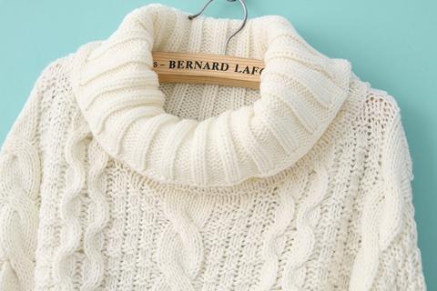 white cable knit turtleneck