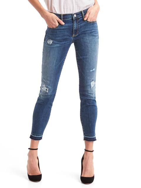 Mid Rise Destructed True Skinny Ankle Jeans